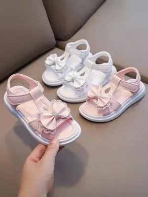 Princess Duties Bow T-Strap Sandals By Liv and Mia